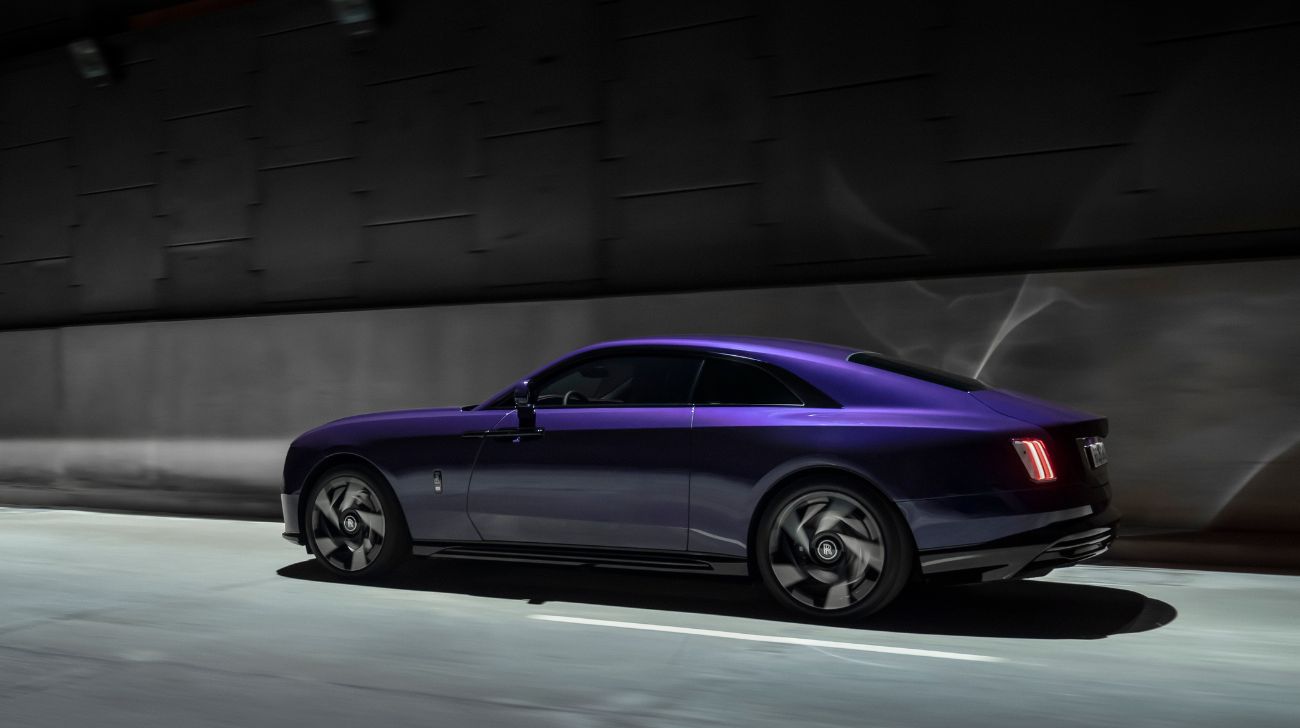 1739960291-rolls Royce Unveils The Black Badge Spectre Rear And Side Look Fastest Roll